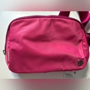 Lululemon Everywhere belt bag 2L in Raspberry Coulis. Brand New, never worn.